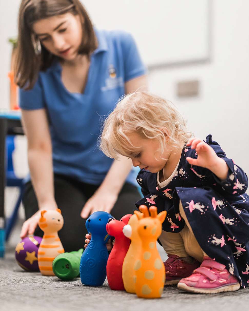 Flinders Speech Pathology Student playing with young child