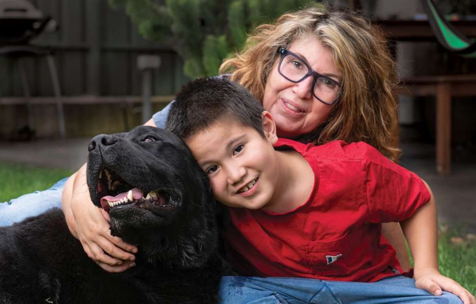 Ann Denham and Marcus with their labrador Jet