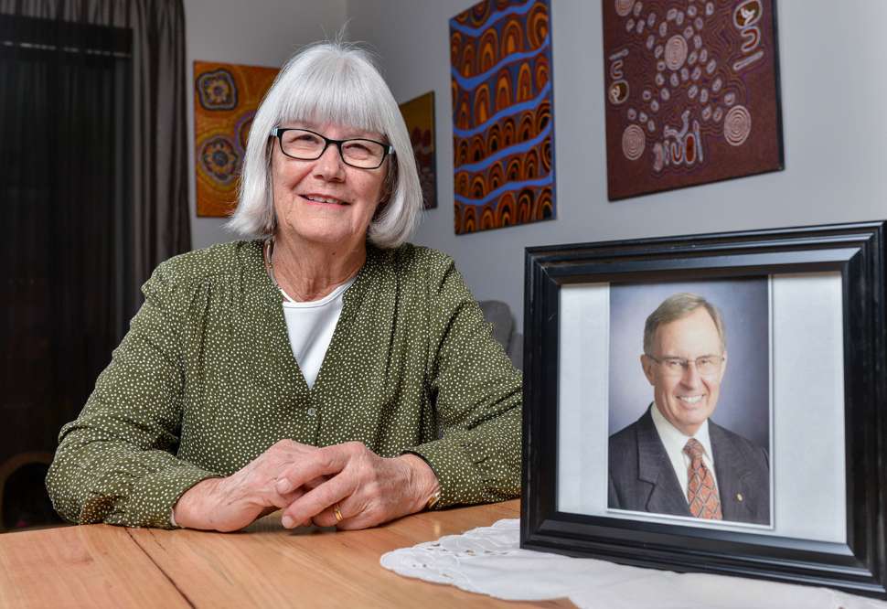 Barbara Wing with photo of husband Emeritus Professor Lindon Wing OAM