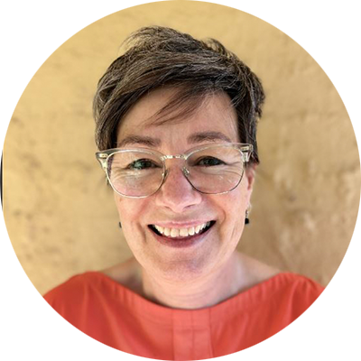 A front on headshot of Third Year Coordinator Dr Kim Milde in front of a yellow backdrop